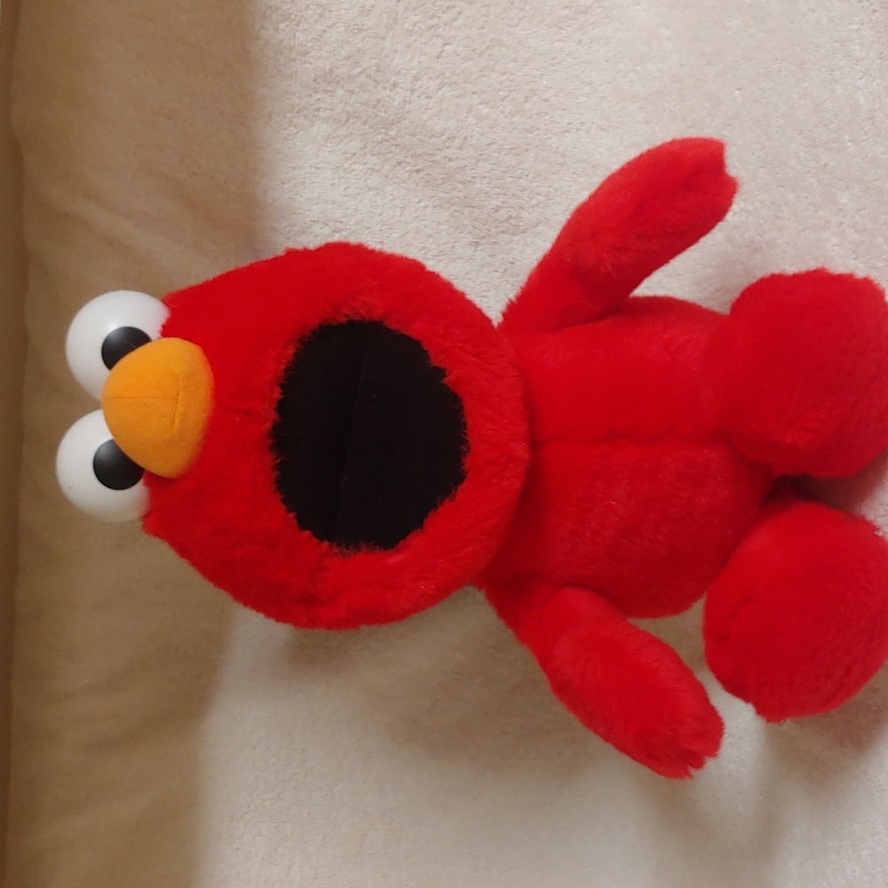 Vintage 1996 tickle Me Elmo...works perfect watch the video